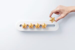 person putting stars on satisfaction meeting