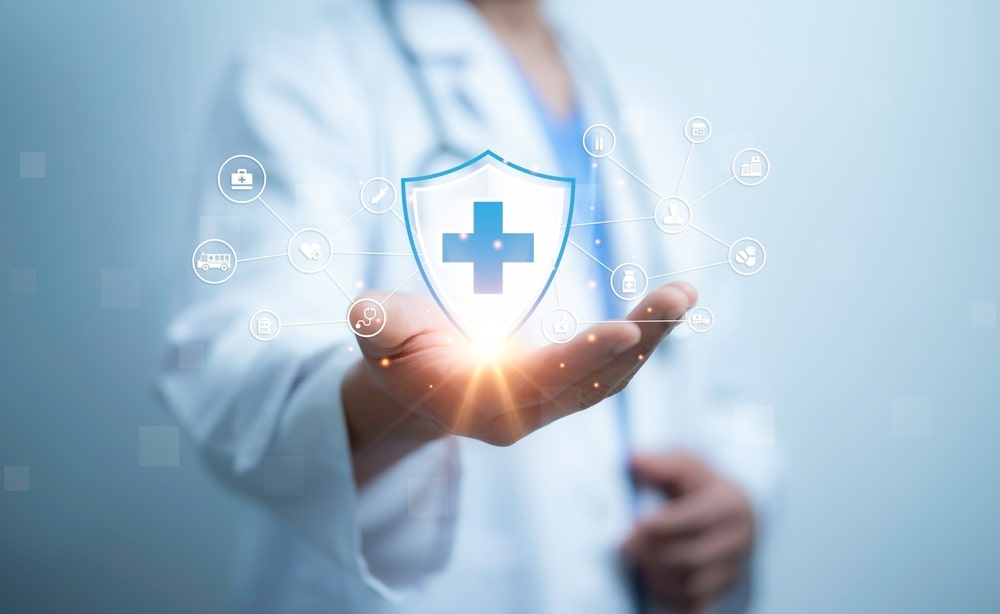 medical worker holding health care icon